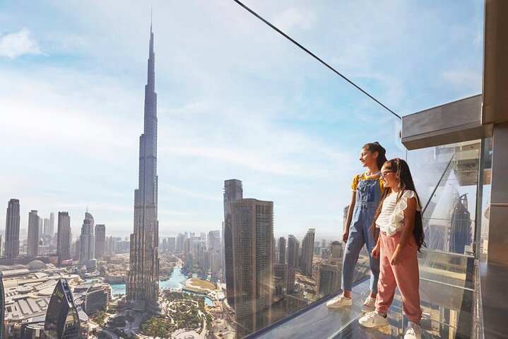 Experience Dubai from a new perspective with astonishing views of the skyline and Burj Khalifa while walking on transparent floors that reveal the city below. An unforgettable adventure awaits.